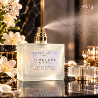 Thumbnail for Tru Fragrance Element Edition XIV Timeless Opal Eau de Parfum 3.4 oz frosted bottle being sprayed