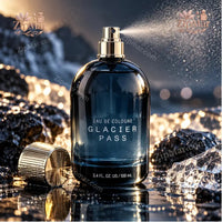 Thumbnail for Tru Fragrance Glacier Pass Eau de Cologne 3.4 oz dark navy bottle being sprayed with glacier landscape