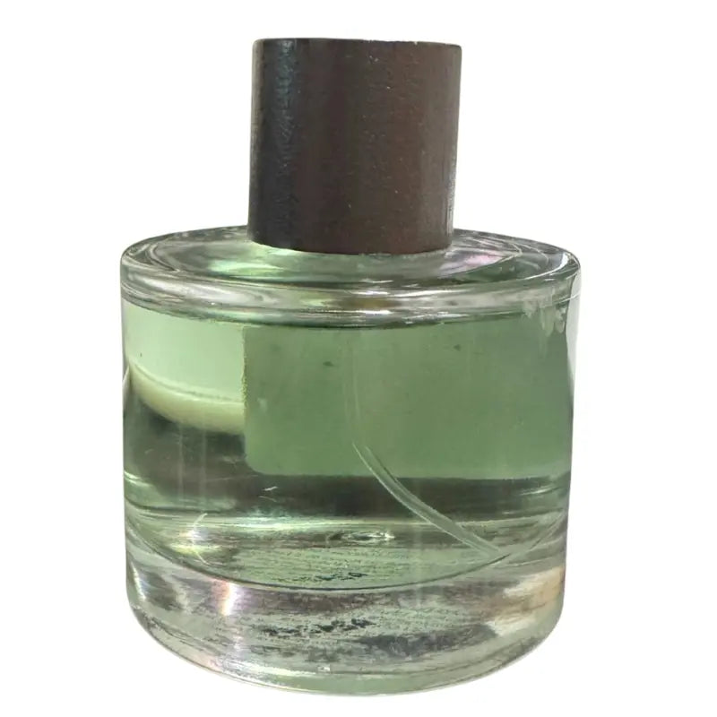 Side profile of the 100ml Imperial Woods glass bottle showing the sleek, rectangular design.