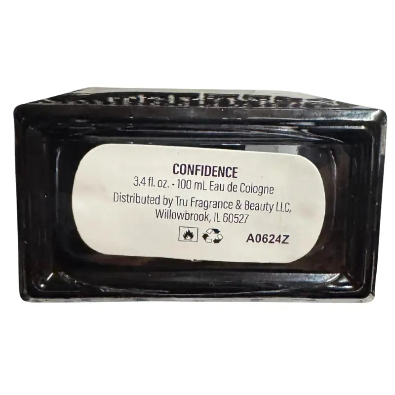 Close-up of manufacturer label on the bottom of Manifest Confidence Eau de Cologne.
