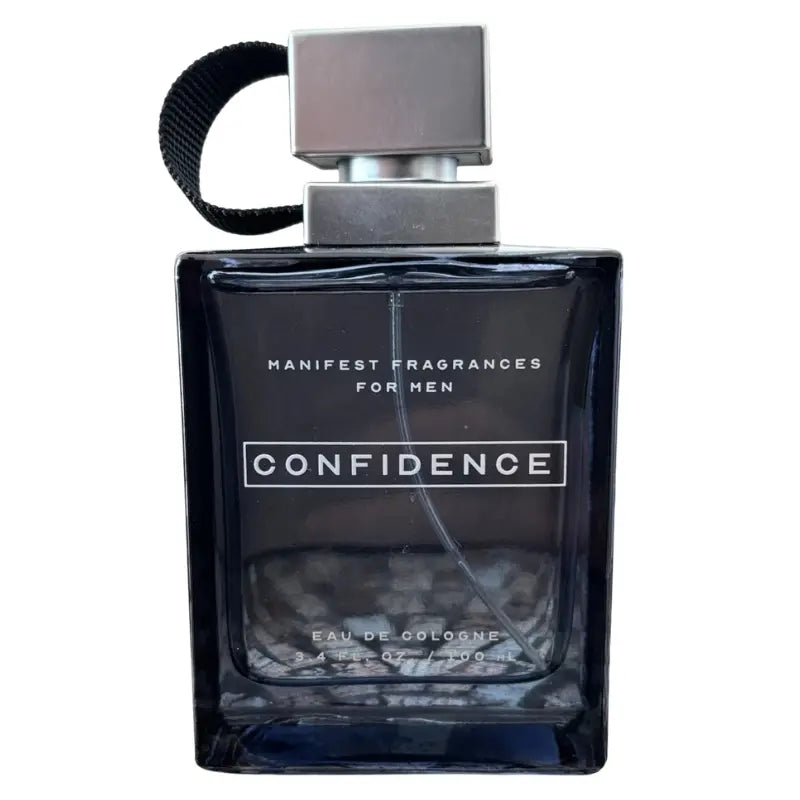 Front view of Tru Fragrance Manifest Confidence 3.4 oz black cologne bottle with silver cap.