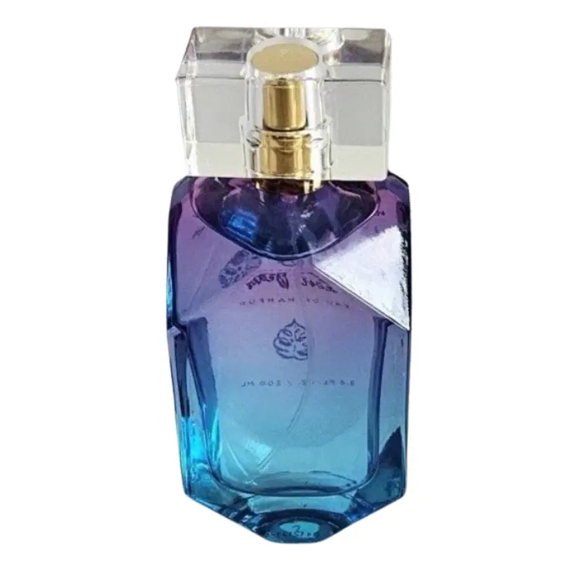 Angled view of the multi-faceted Neon Beach perfume bottle highlighting the sunset gradient.