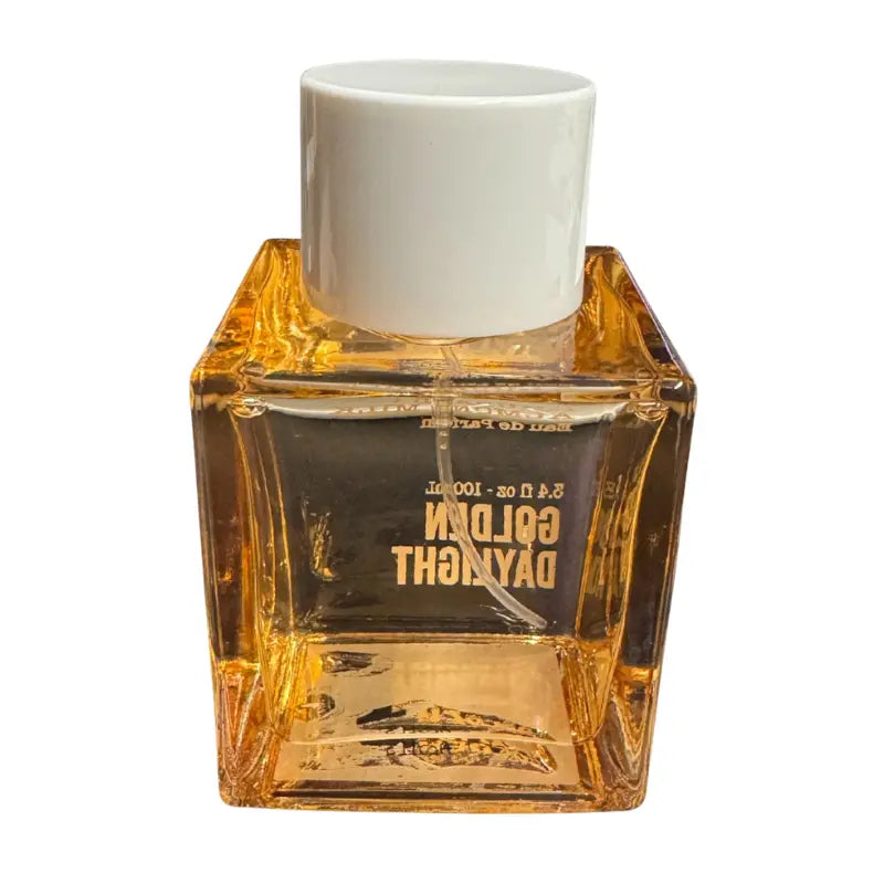 Back view of the clear glass bottle of Tru Fragrance Golden Daylight perfume, showing the amber-colored liquid and white cap.