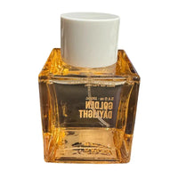 Thumbnail for Back view of the clear glass bottle of Tru Fragrance Golden Daylight perfume, showing the amber-colored liquid and white cap.