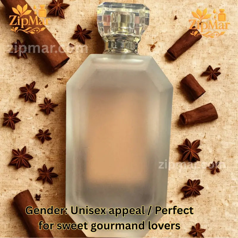 Back view of Tru Fragrance Star Spangled Apple Pie frosted glass bottle surrounded by cinnamon sticks and star anise
