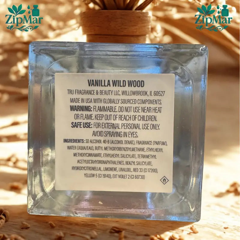 Back label of Tru Fragrance Vanilla Wild Wood bottle detailing manufacturer info and ingredients