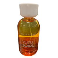 Thumbnail for Front view of Tru Fragrance Yuzu Swirl Eau de Parfum 3.4 oz bottle with vibrant yellow-to-orange gradient.