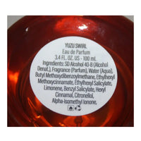 Thumbnail for Pair of Tru Fragrance Yuzu Swirl perfume bottles, showing one with the atomizer exposed and the other with its white cap on.