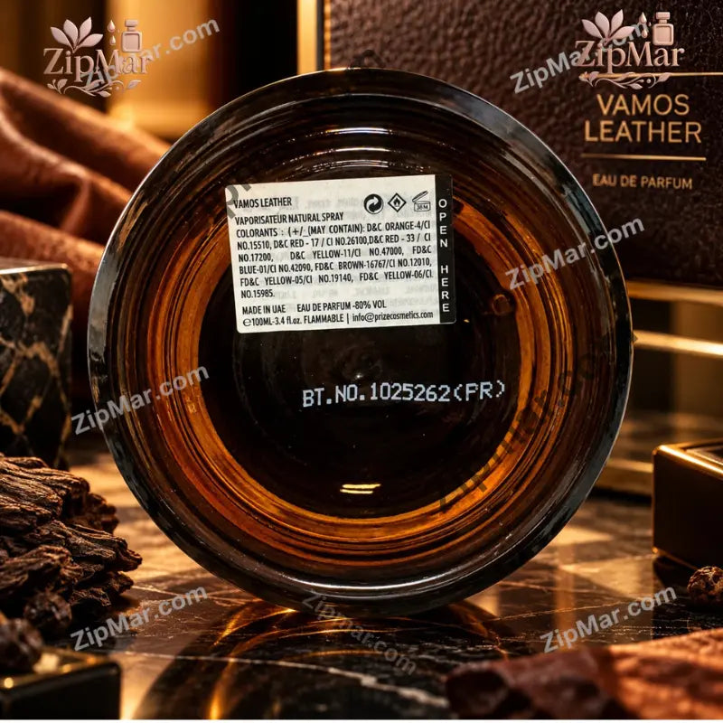 Base label of Vamos Leather eau de parfum 100 mL showing Made in UAE, ingredients and batch number