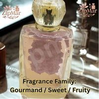 Thumbnail for Back view of Whipped Cream and Berries Eau de Parfum clear faceted glass bottle with pink liquid and crystal style cap
