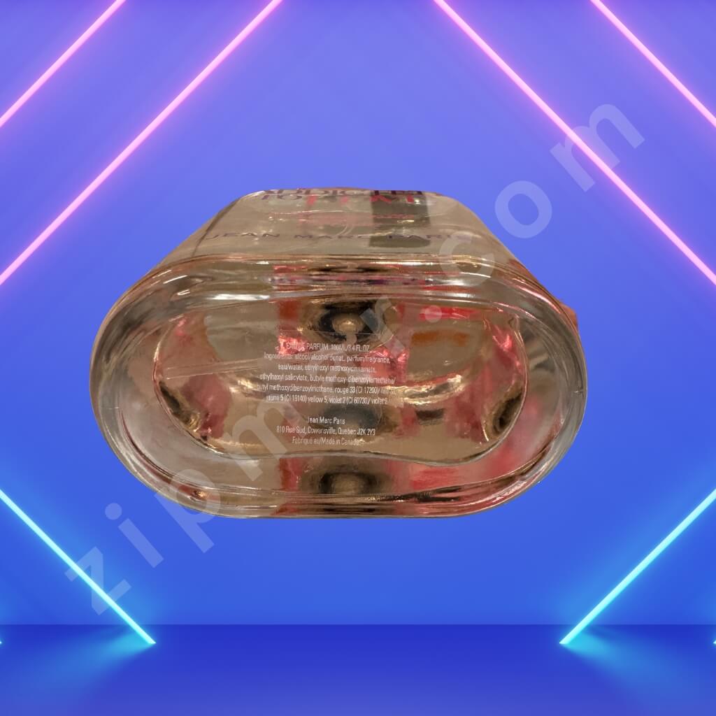 Clear plastic object with text on a blue background with neon lines