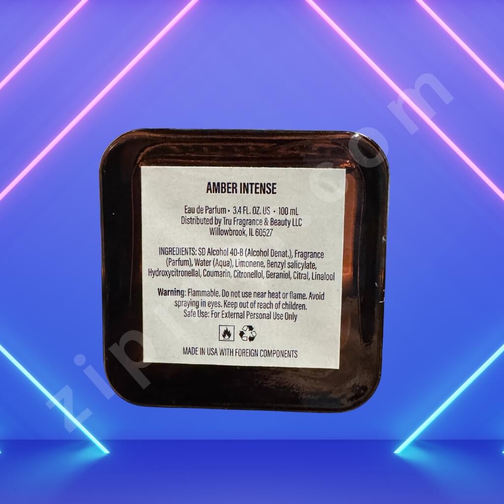 Amber Intense perfume packaging with label on a blue and pink neon light background