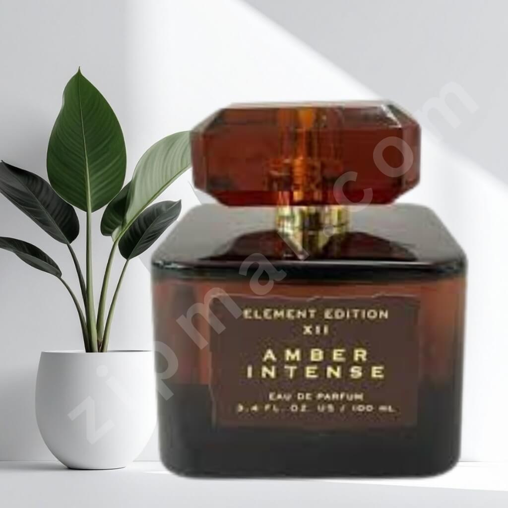 Amber intense perfume bottle with a plant in the background