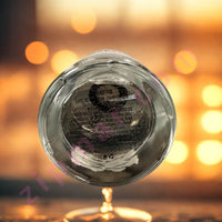 Thumbnail for Close-up of a glass container with a blurred bokeh background