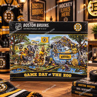 Thumbnail for YouTheFan Boston Bruins Game Day at the Zoo 500-piece jigsaw puzzle box front — NHL officially licensed — panoramic cartoon zoo animals in black and gold Bruins gear — 28 x 10.5 inch completed size — clean product shot