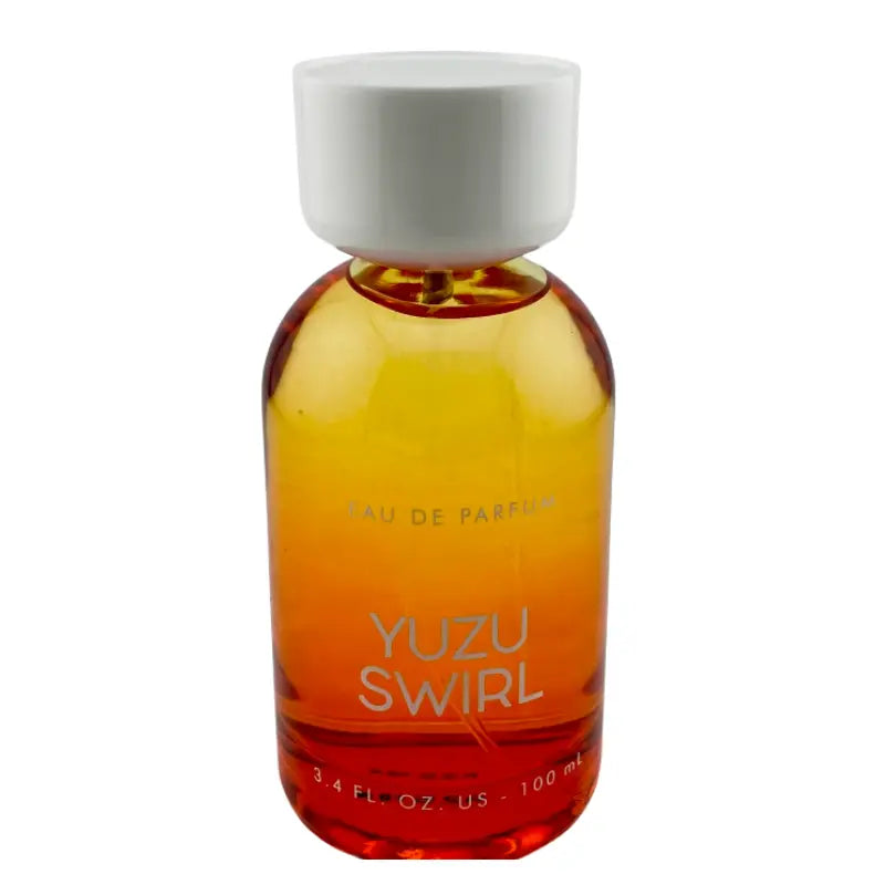 Another perspective of the Tru Fragrance Yuzu Swirl Eau de Parfum bottle, highlighting the vibrant yellow and orange tones.