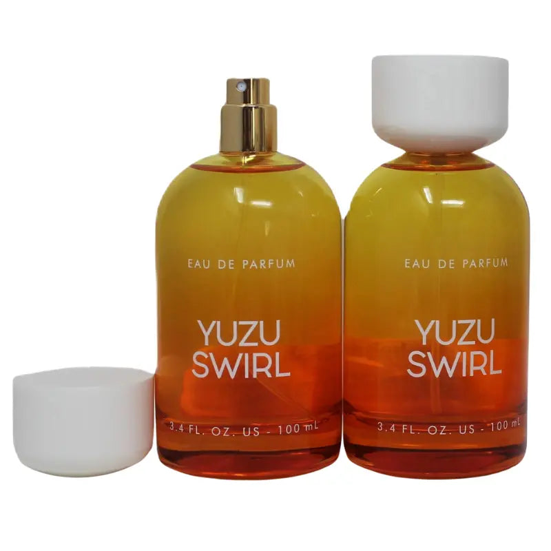 Tru Fragrance Yuzu Swirl Eau de Parfum 3.4 oz bottle with clear front label and distinctive ombre coloring.