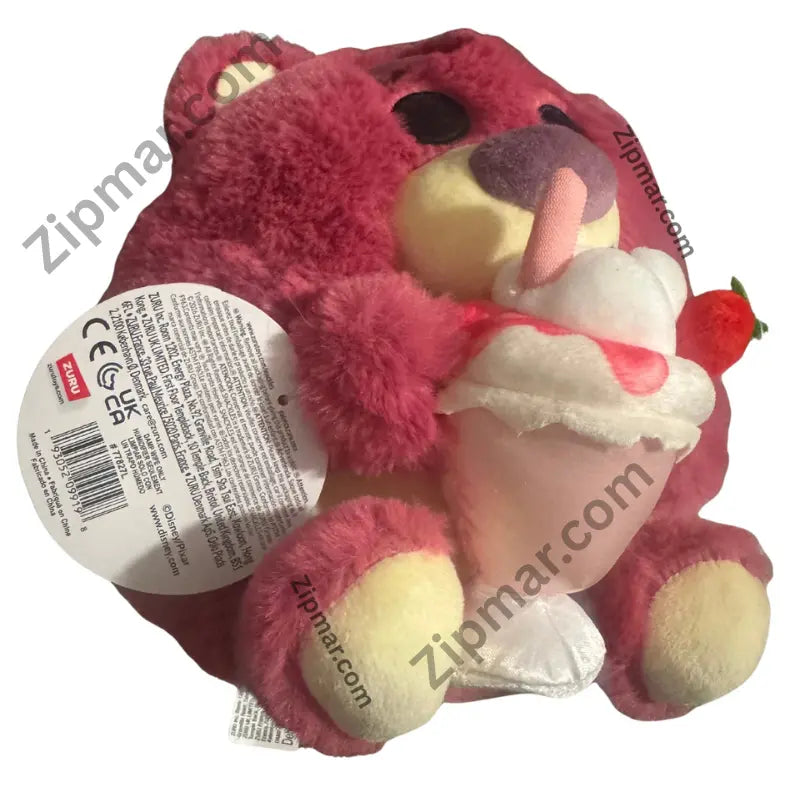 Back of Lotso Snackles plush with ZURU hang tag showing barcode and Made in China
