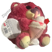 Thumbnail for Back of Lotso Snackles plush with ZURU hang tag showing barcode and Made in China